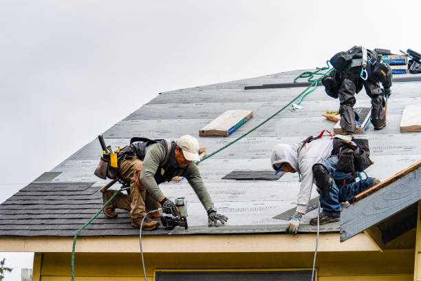 Professional Gutter Installation technician working in Boylston, MA